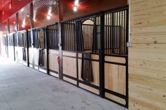 Stall Front No. 2A - Traditional stall front with sliding door, JR Elite wood load, and grill feed door