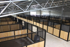 Stall Front No. 2W - Traditional stall front with center rolling door and vertical wood load