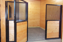 Stall Front No. 2Z - Custom Tri-Fold Stall front with horizontal wood load and standard drop panel door