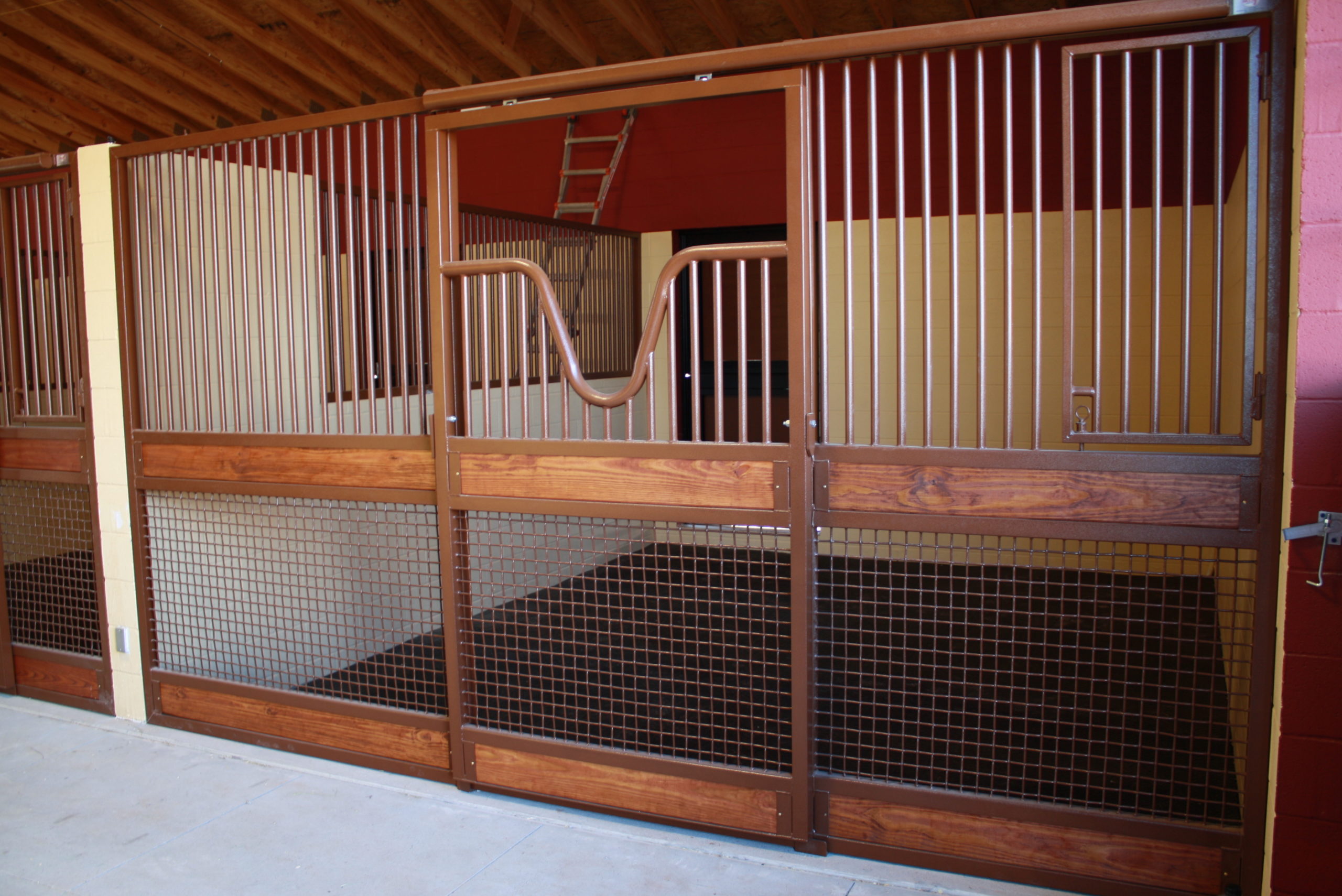Light brown themed mesh bottom stall fronts